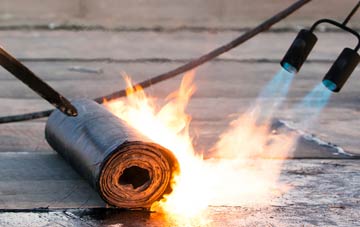 Swining asphalt flat roofing repairs