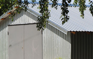 repairing Swining metal garage roofing