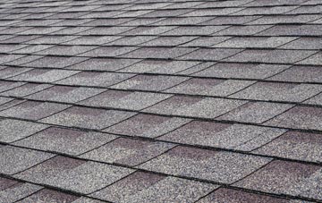 Swining tiles for shallow pitch roofing