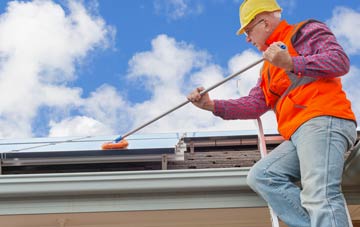 Swining soft wash roof cleaning